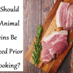 How Should Raw Animal Proteins Be Stacked Prior To Cooking