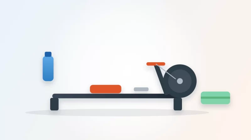 Is rowing good cardio illustration: a rowing machine beside a water bottle and a towel